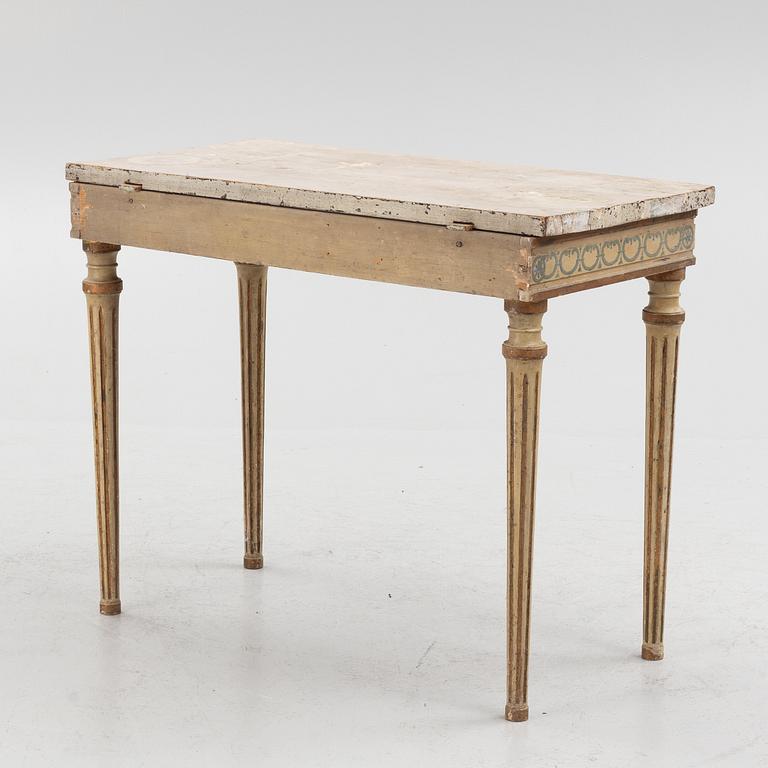 A late Gustavian white-painted and gilt console table, late 18th century.