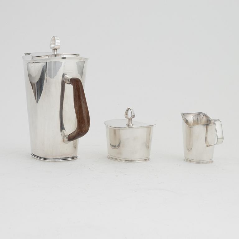 Vera Ferngren, a silver coffee pot, a lidded sugarbowl and a creamer, GAB, Stockholm, 1964-1965.