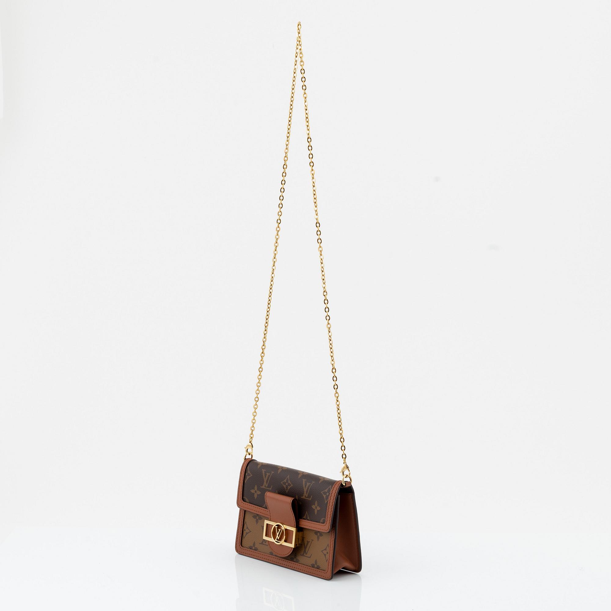 Louis Vuitton, a monogram canvas and brown leather 'Dauphine' bag/chain wallet, 2020.