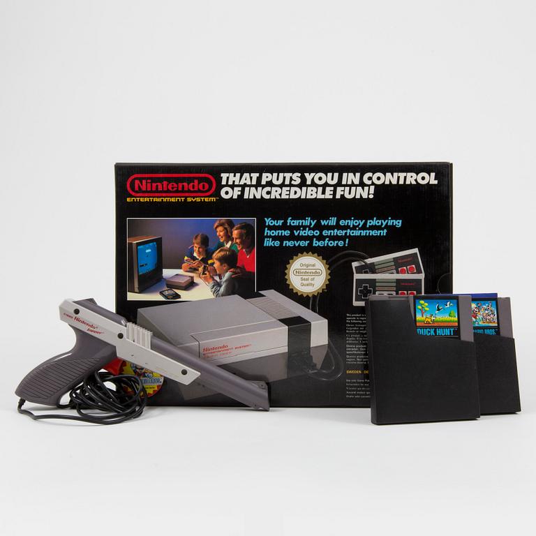 A Nintendo 8-bit console and two games, Bergsala, 1980s.