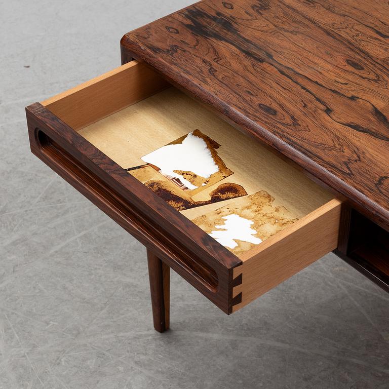 A 1960's rosewood coffee table.