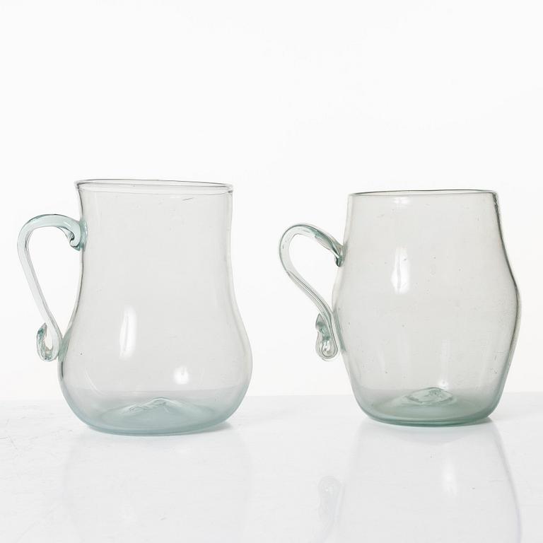A set of two Swedish glass tankards, early 19th century.