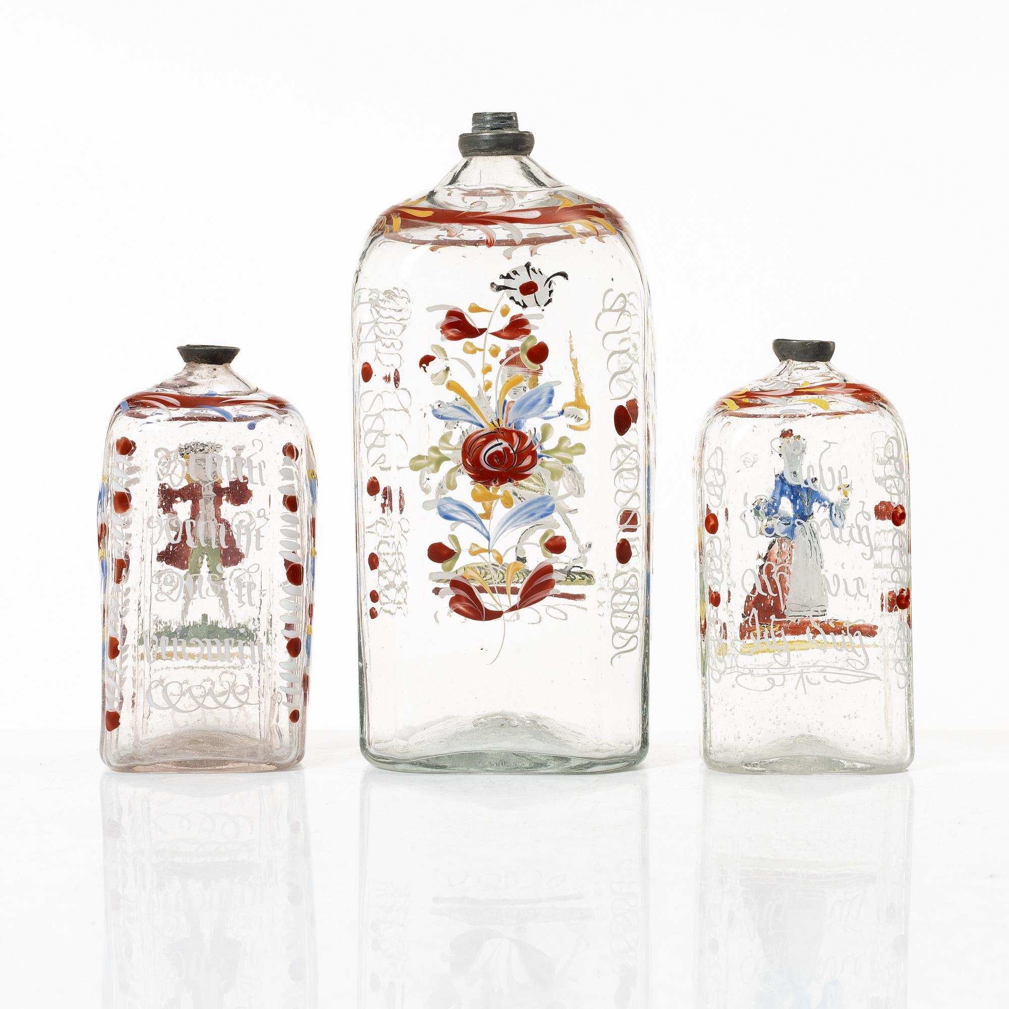 Three glass bottles, possibly Germany, 19th century.