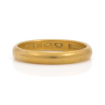 A 23K gold ring.