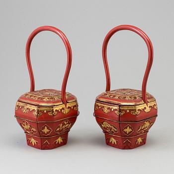 A pair of Chinese red lacquered baskets, early 20th Century.