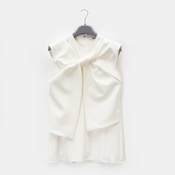 Céline, a bow top, size 36.