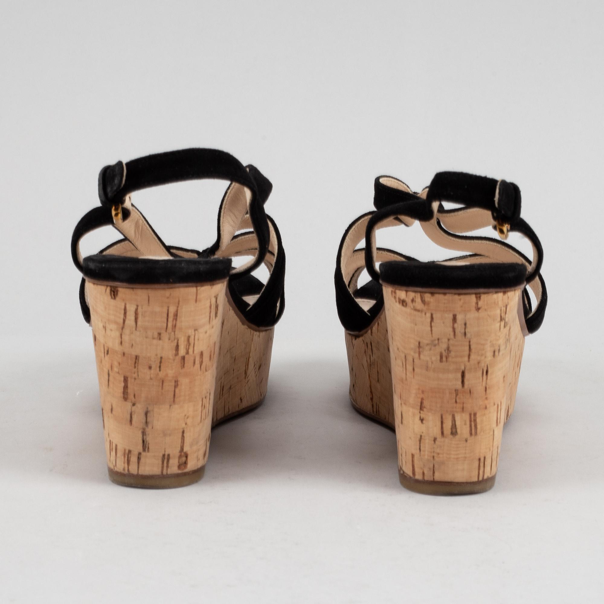 Prada, a pair of black suede wedge sandals, size 39½.