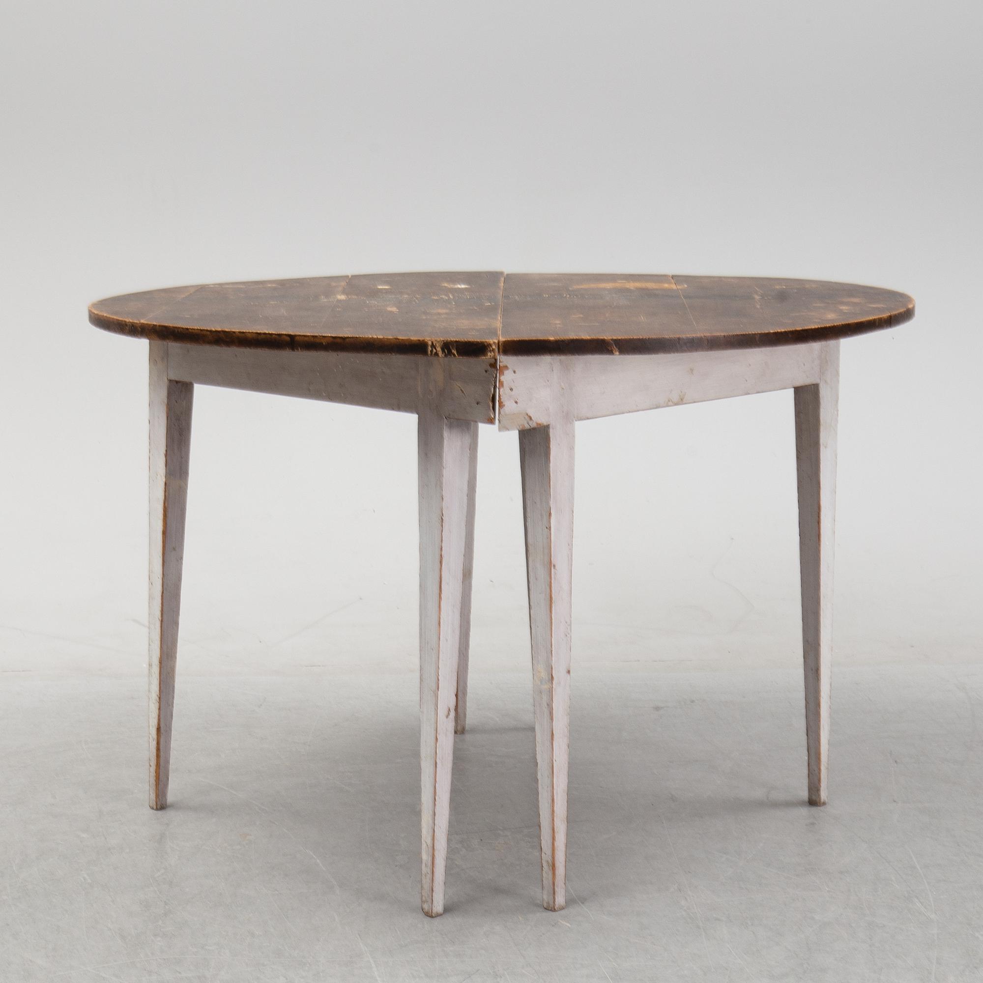 A pair of painted side tables, 19th Century.