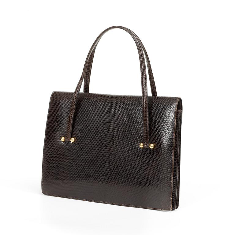 A 1070s handbag by Hermès.