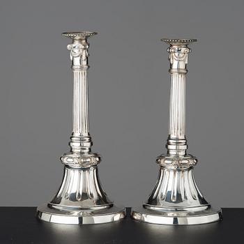 Two similar Gustavian late 18th century candlesticks.