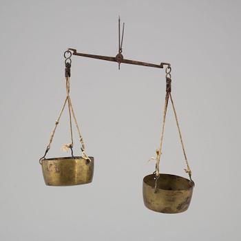 A 19th/20th century brass scale.