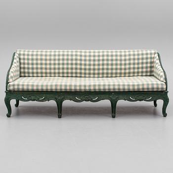 A mid 18th century rococo sofa.