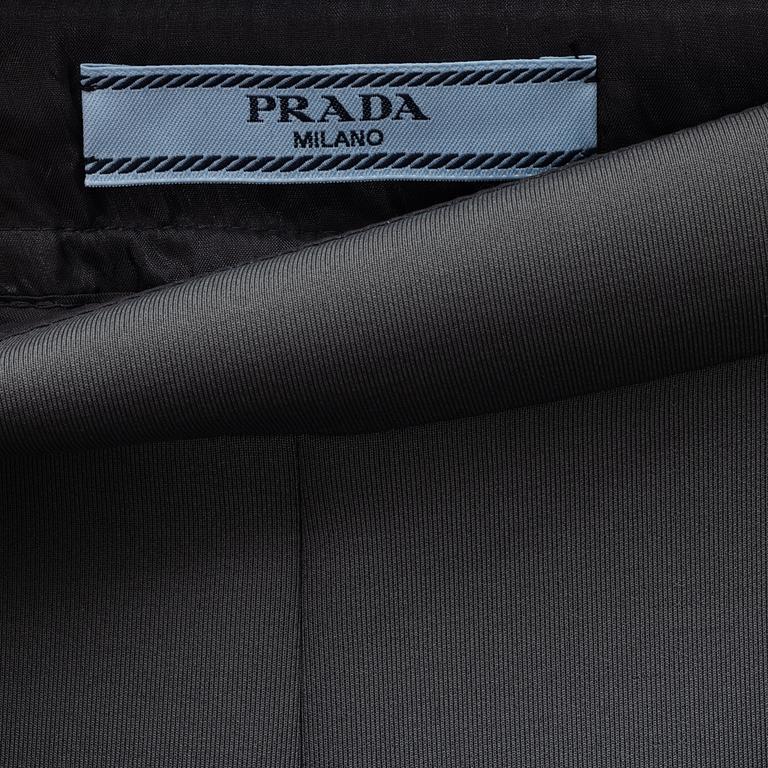 Prada, a pair of grey scuba pants, size 36.