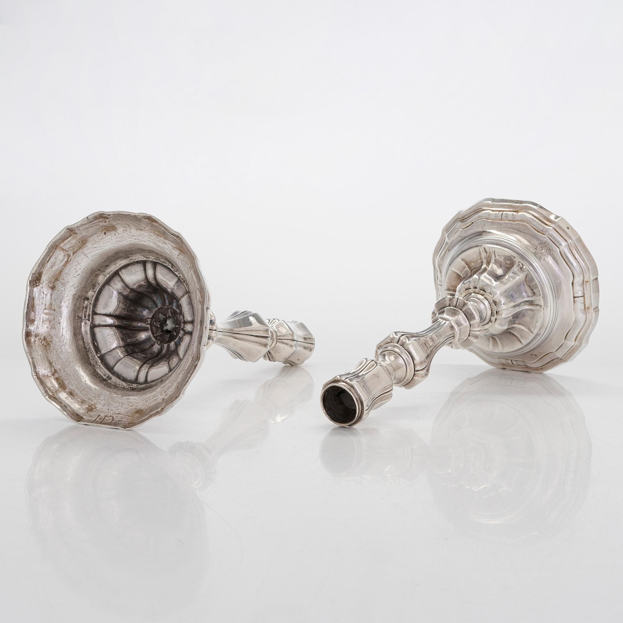 A pair of 18th-Centuty French silver candlesticks, maker's mark of Jean-Joseph Falguière (active in Dinan 1744-1773).