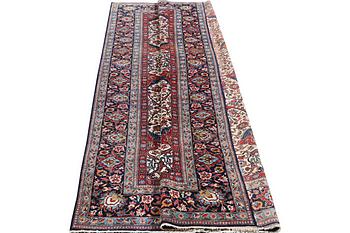 A semi.antique Kashan, c. 319 x 212 cm.