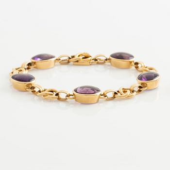 Bracelet and ring, 18K gold with cabochon-cut amethysts.