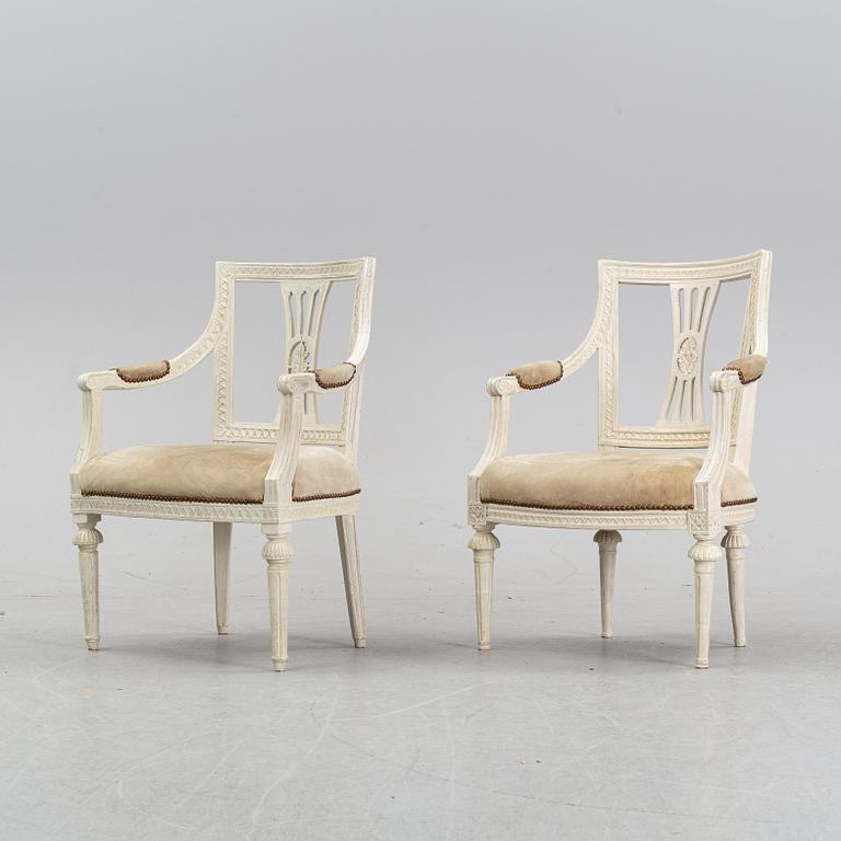 A set of two Gustavian arm chairs from the early 19th Century.