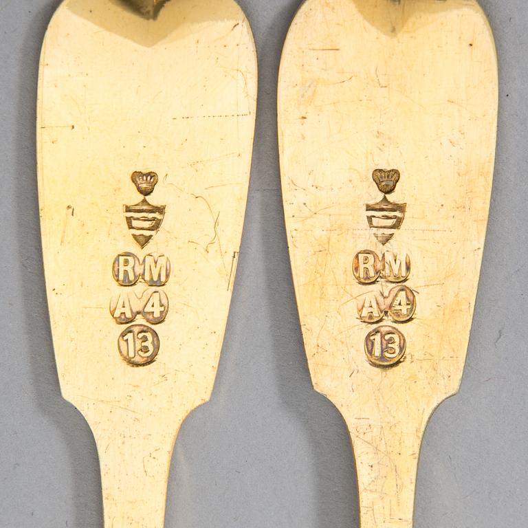 A 3-piece gilt silver cutlery set, maker's mark of Otto Roland Mellin, Helsinki 1882.