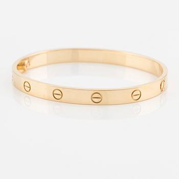 An 18K gold Cartier "Love" bracelet.