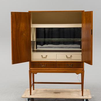 A mid 20th Century bar cabinet.