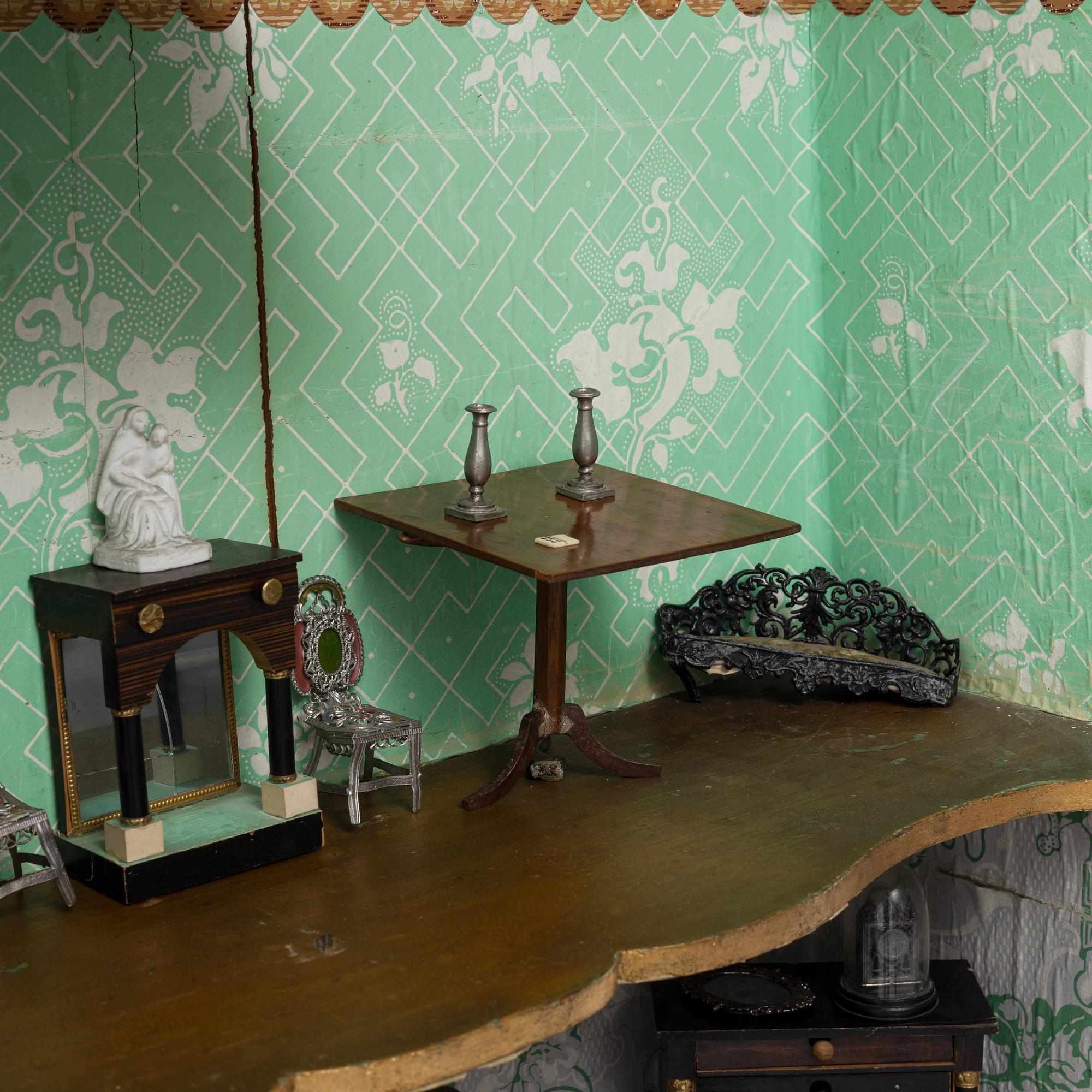 An 18th century cabinet / doll's house.