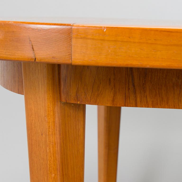 A mid-20th century dining table.