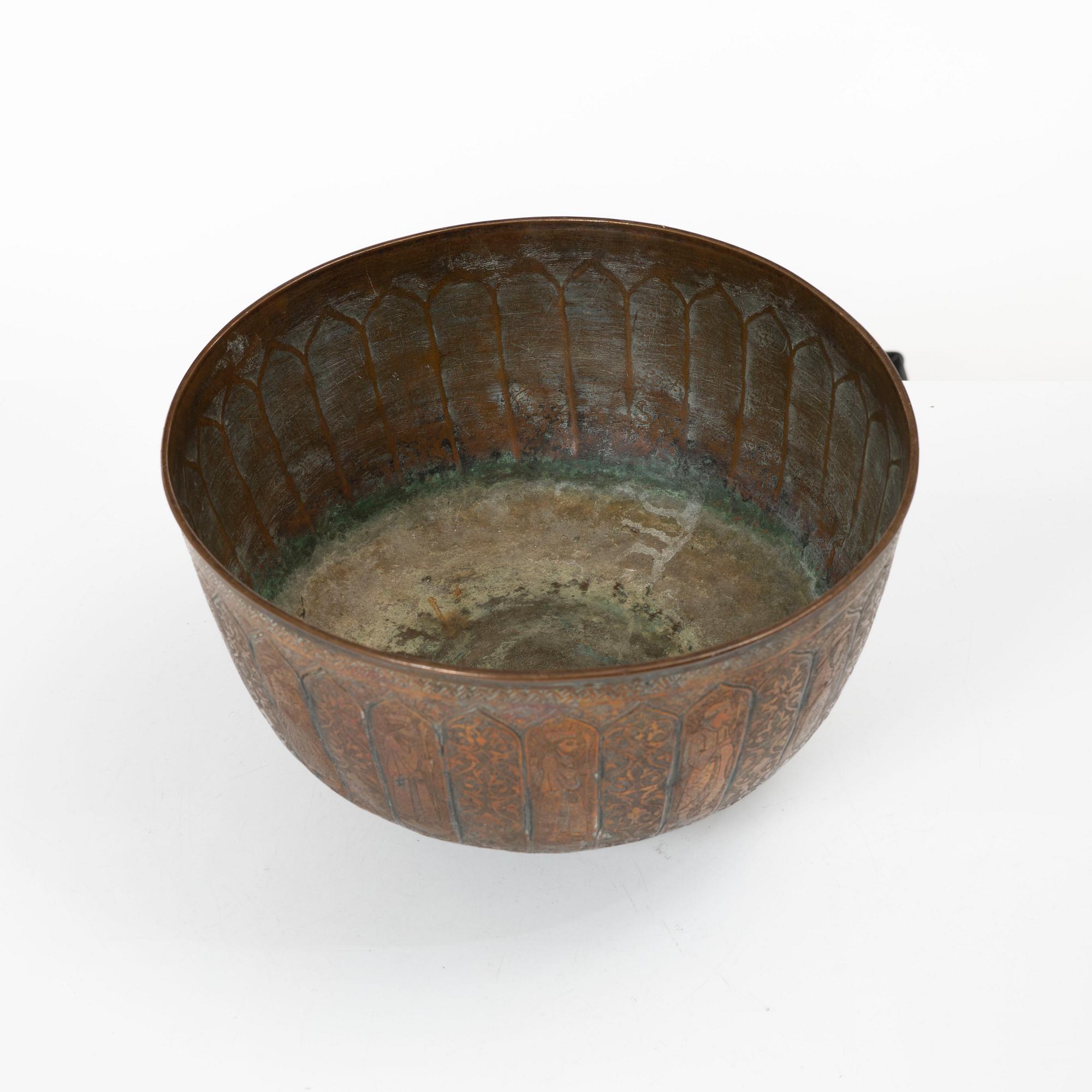 A large Persian copper bowl, late Qajar dynasty / early 1900s.