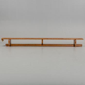 A first half of the 20th century pine bench.