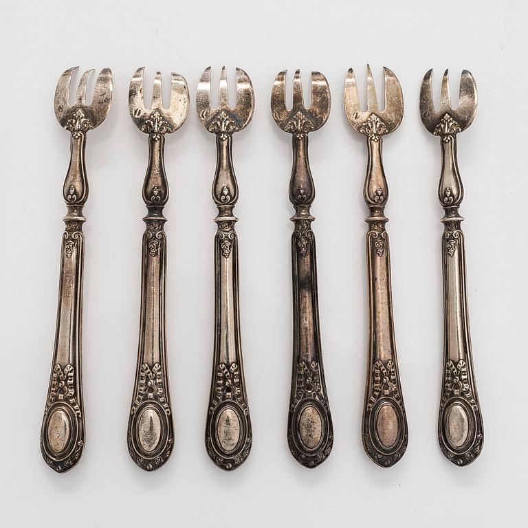 Emile Huignard, A set of six oyster forks, Silver (950), Paris, late 19th century.