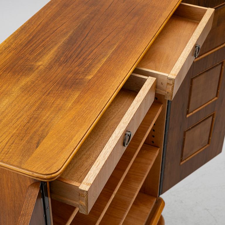 Eugen Höglund, a walnut cabinet, executed in his workshop in Vetlanda, Sweden 1950s.