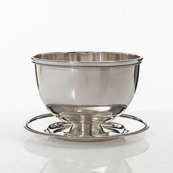 A Swedish silver Sweetmeat/sauce bowl on a plate, mark of company Guldsmedsaktiebolaget, Stockholm 1962.