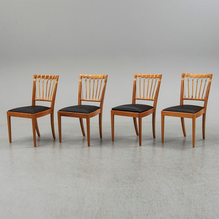 A set of four mahogany and rattan dining chairs, Josef Frank, , model 1165, Svenskt Tenn, Stockholm.