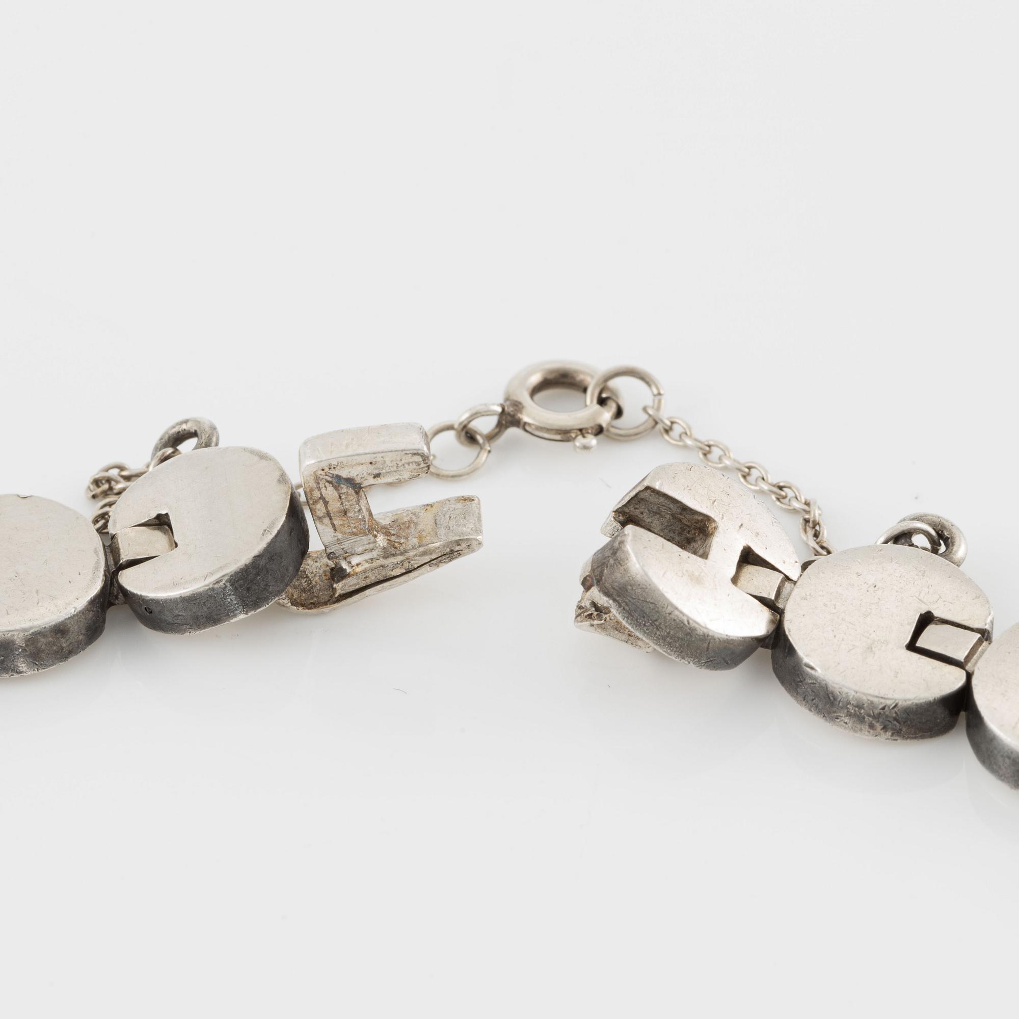 A silver necklace.