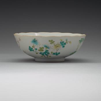 A famille rose bowl, late Qing dynasty, with Daoguangs sealmark in red.