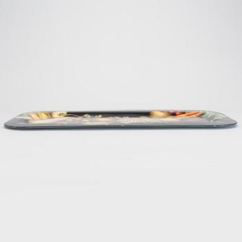 A Piero Fornasetti tray.