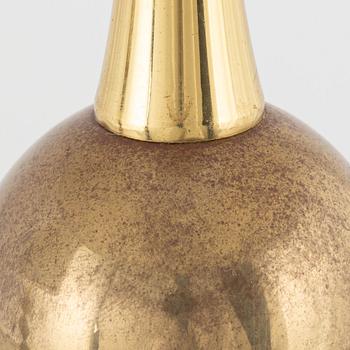 A pair of table lamps, yellow metal, second half of the 20th century.