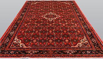 A Hosseinabad carpet,, ca 310 x 210 cm.