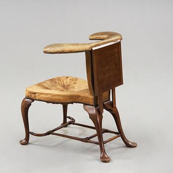 An English 18th century reading and writing chair.