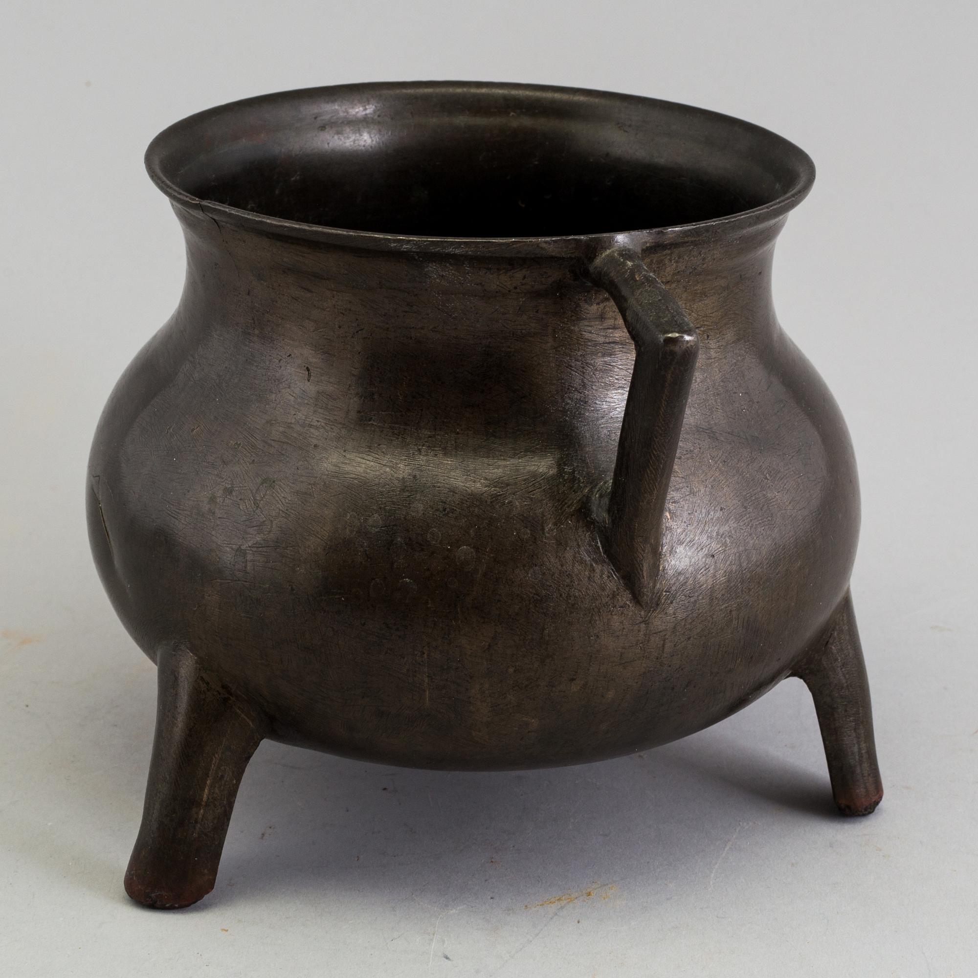 A medieval bronze pot.