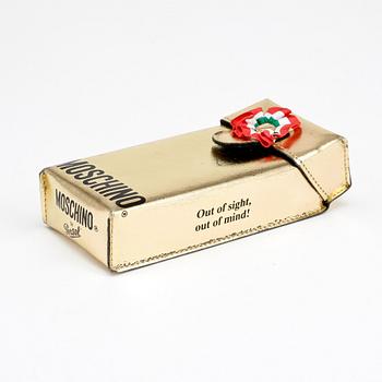 MOSCHINO, a pair of sunglasses.