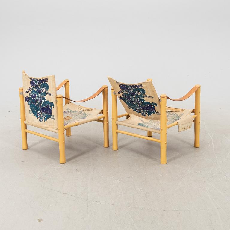 Elias Svedberg, a pair of Safari armchairs from Triva, NK (Nordiska kompaniet) later part of the 20th century.