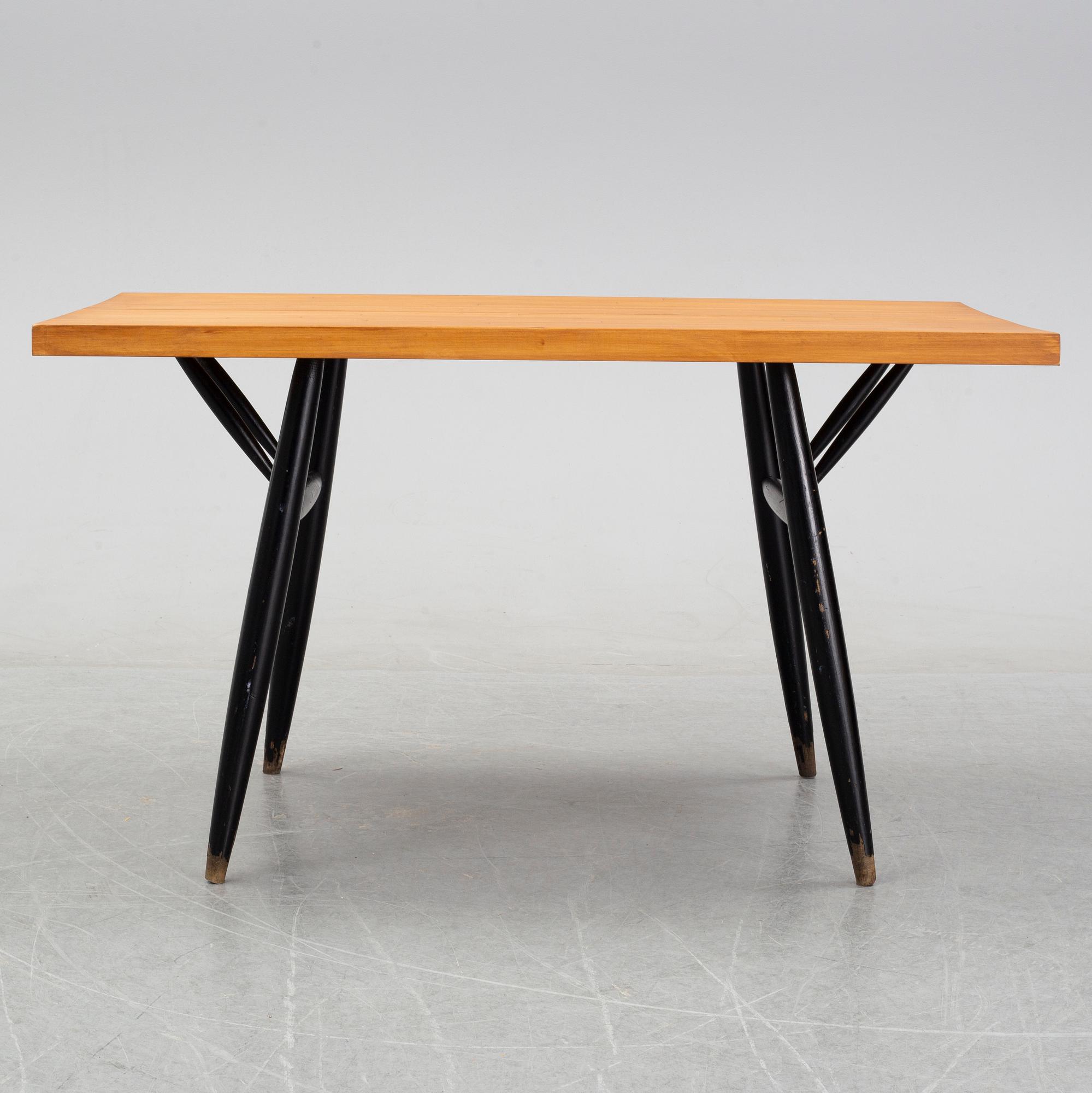 Ilmari Tapiovaara, a 'Pirkka' pine dine table, second half of the 20th Century.