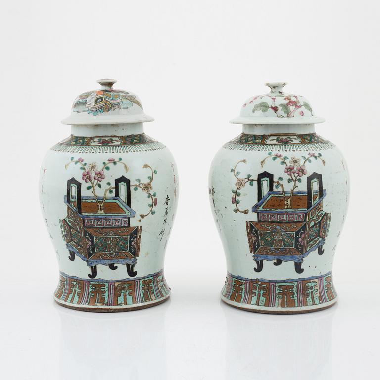 A pair of Chinese lidded urns, late Qing dynasty, around the year 1900.