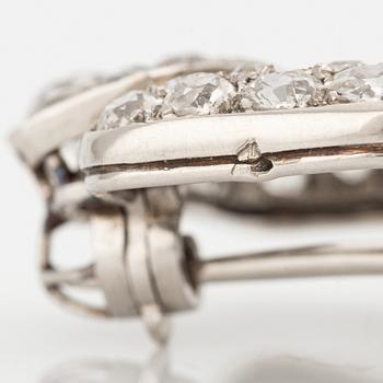 A Cartier platinum brooch set with old-cut diamonds, Art Déco.