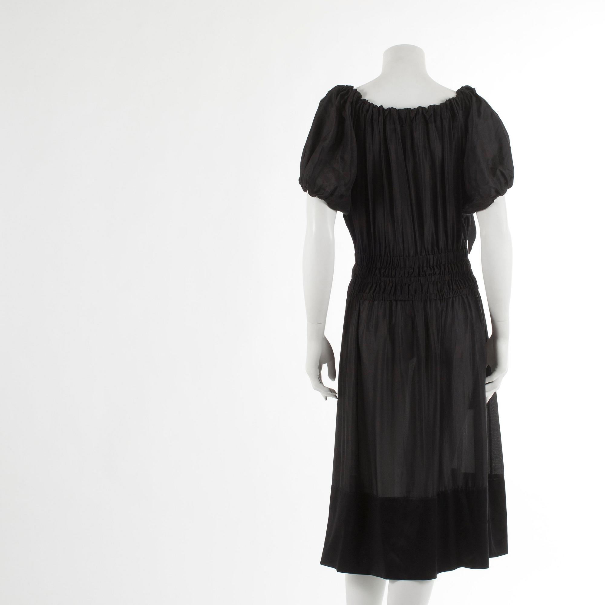 DKNY, a black silk dress. Size M.