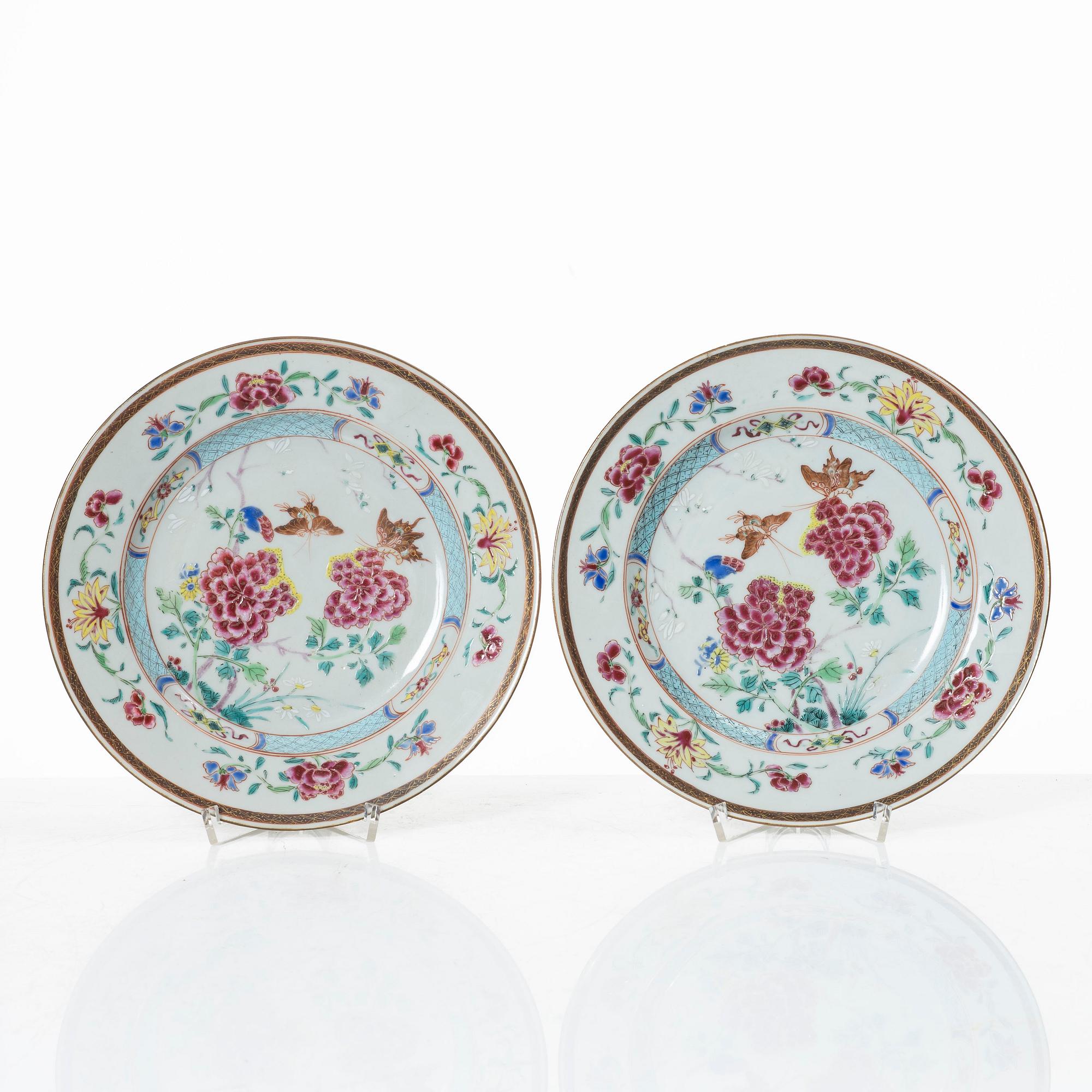 Two famille rose plates and a bowl, Qing dynasty, 18th century.