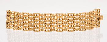 An 18C gold bracelet weight 67,6 grams length 19,5 cm.
