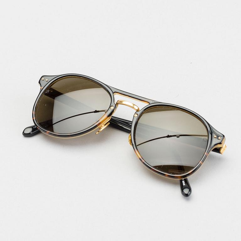 Sunglasses by LINDA FARROW LUXE.