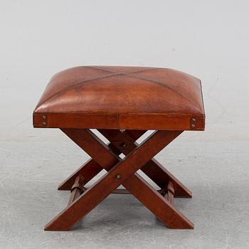 A contemporary dressing table with stool.