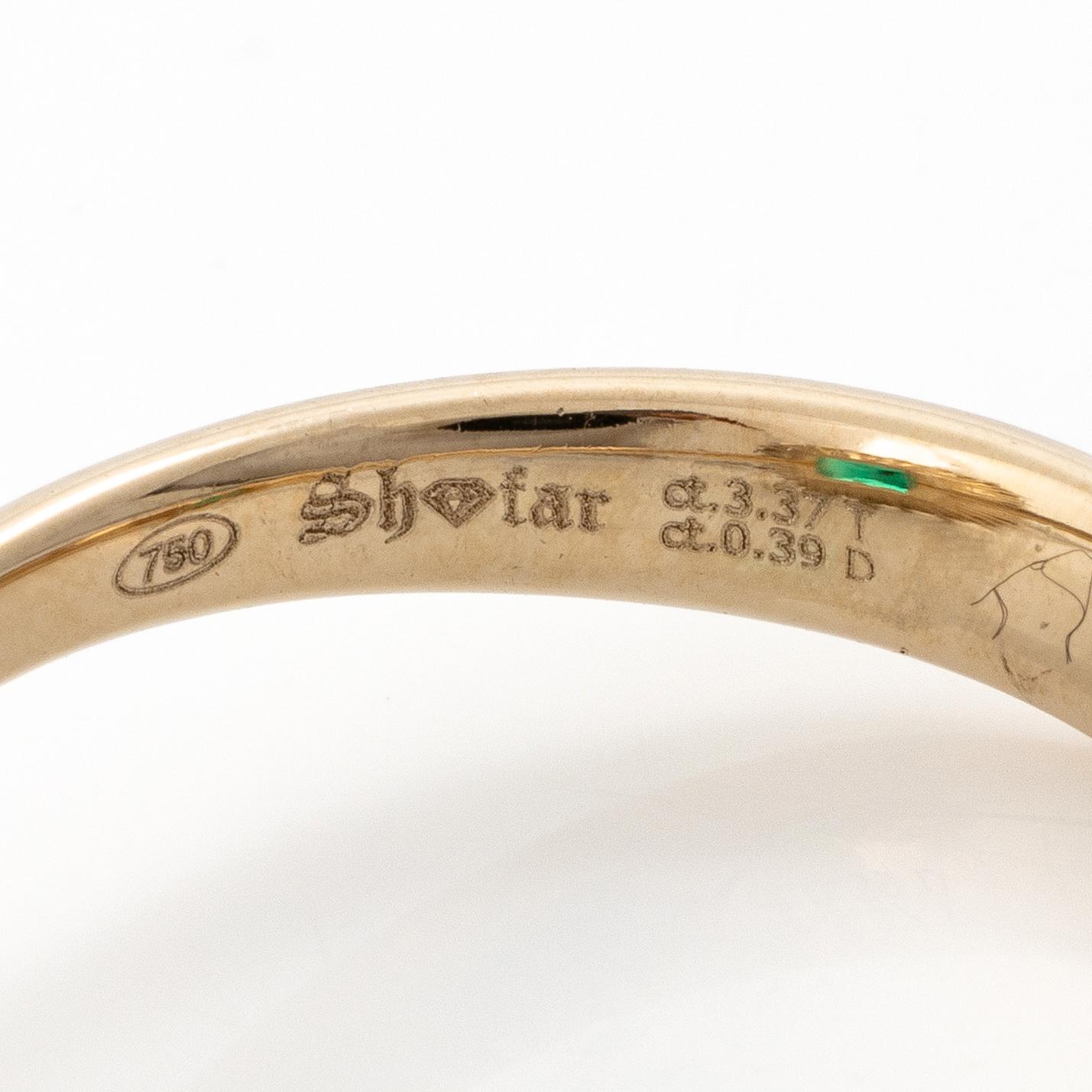 Ring 18K white gold with synthetic emerald and brilliant-cut diamonds.